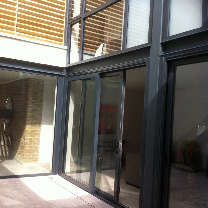Anthracite aluminium sliding patio doors fitted in Carshalton